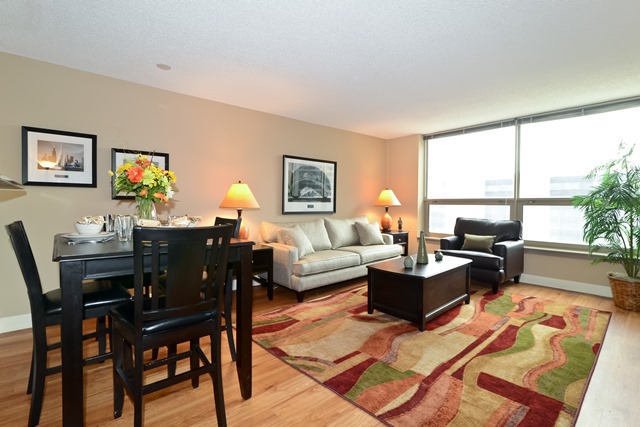 One Bedroom Apartment: Actual Living and Dining Area at Presidential ...