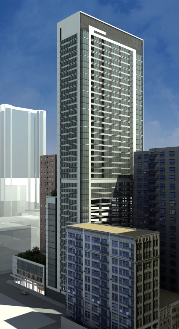 A modern high-rise building with glass and steel facade stands among other mid-rise and high-rise buildings in an urban area under a blue sky.