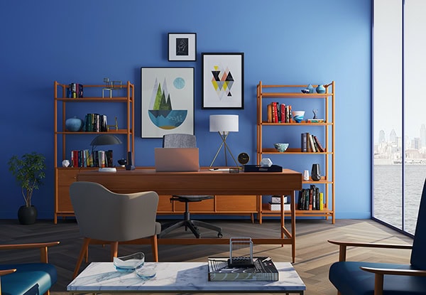 Modern office with a wooden desk, bookshelves, various decor items, and wall art, set against blue walls and a large window with a city view.
